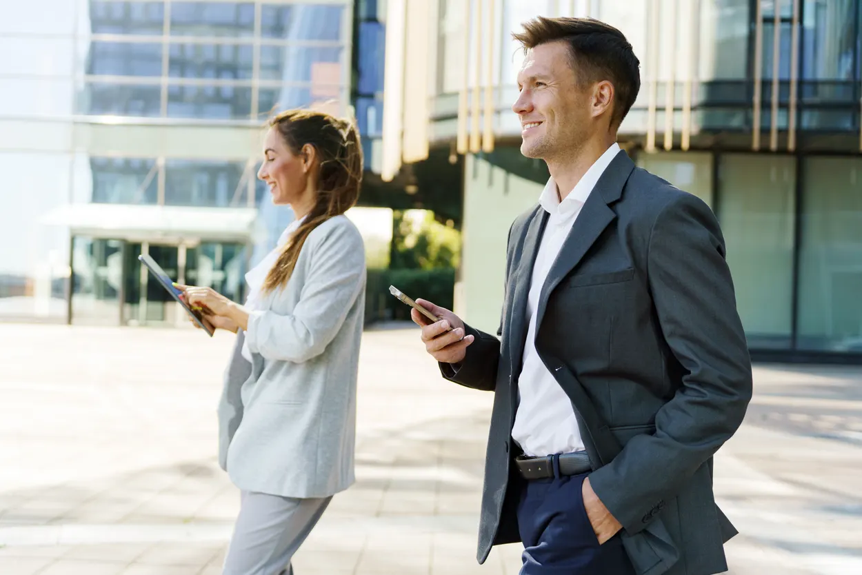 Business people outside an office building
